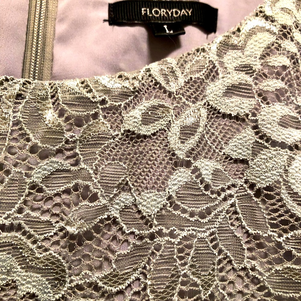 Beautiful light blue/gray in color gorgeous lace overlay with organza skirt